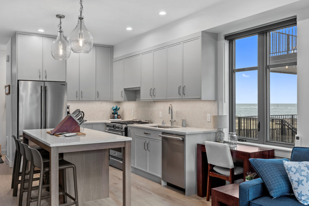 Premiere townhouse modern kitchen with stainless steel appliances and gas range